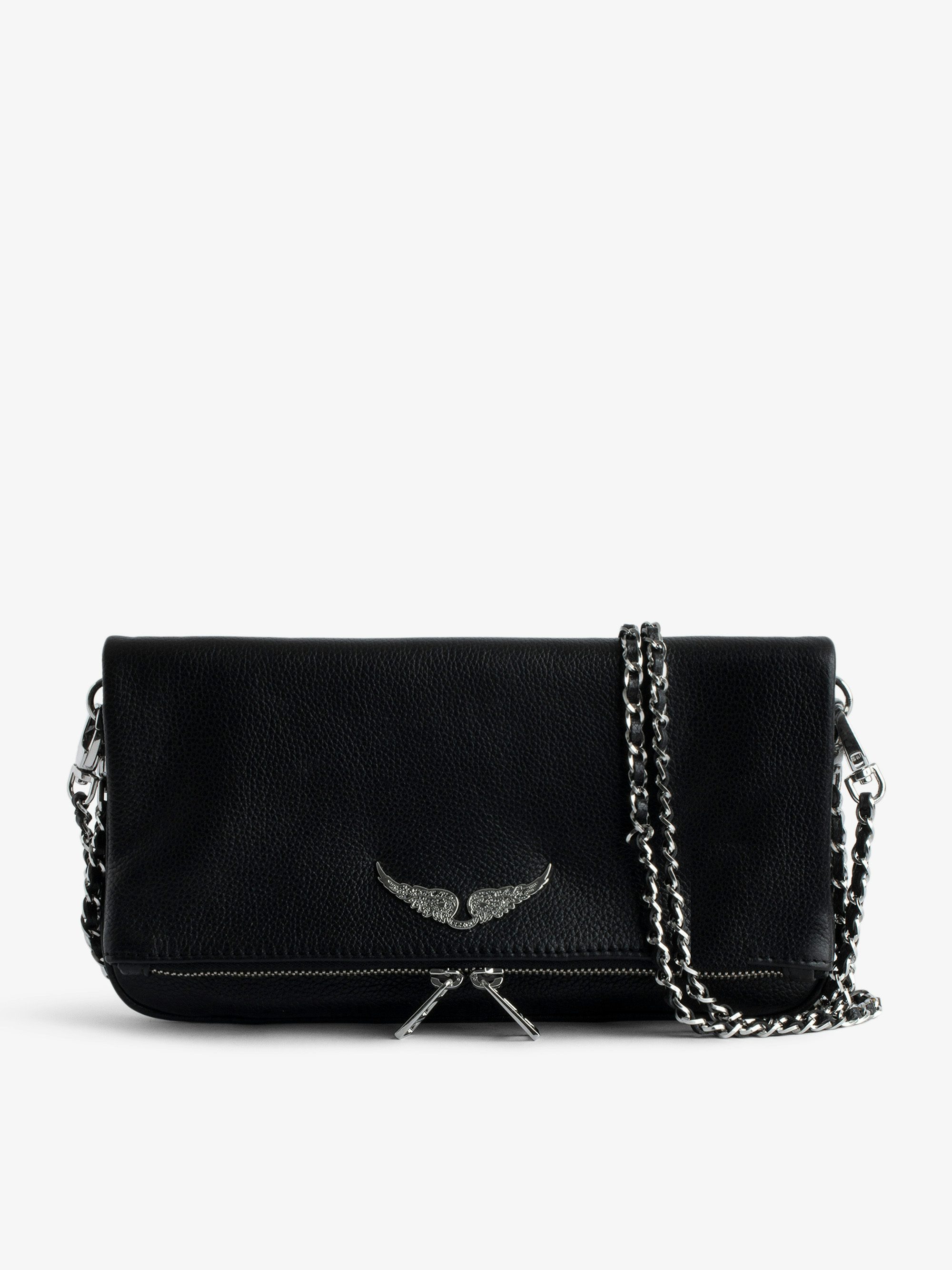 Rock Clutch - The iconic Rock women's leather clutch will take you seamlessly from day to evening.
It features a double chain and leather strap, so you can choose to wear it across the body or on the shoulder.